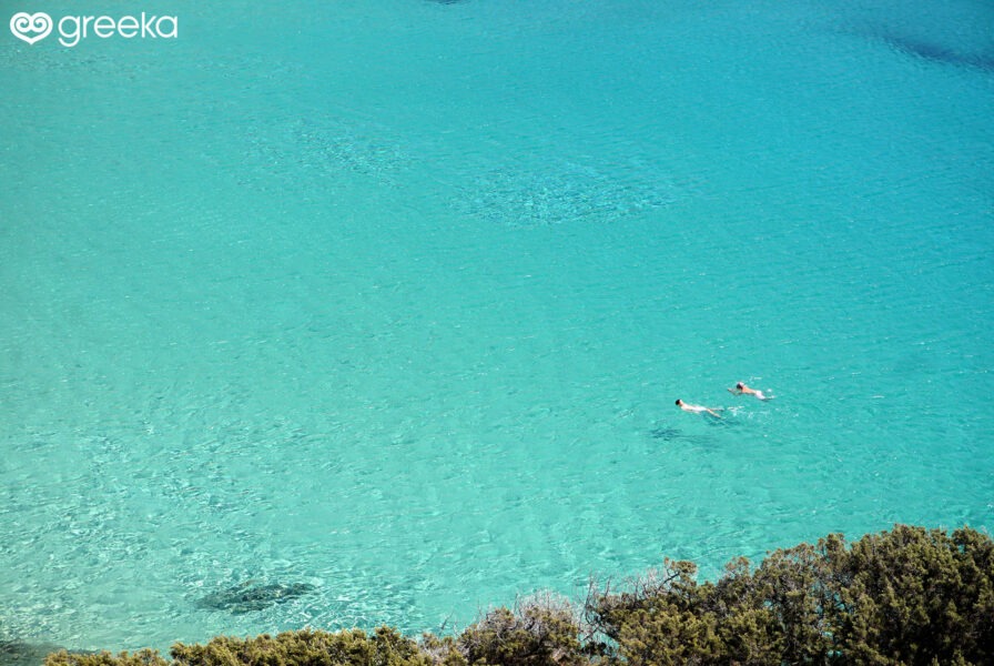 Swimming in the crystal clear waters of Kedros beach, Donoussa